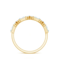 Moissanite flower wedding band ring by Rosec Jewels featuring a delicate floral design and sparkling gemstones.