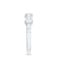 Round cut moissanite half eternity band ring by Rosec Jewels featuring sparkling gemstones set in a sleek gold band.