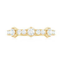Round cut moissanite half eternity band ring by Rosec Jewels with sparkling stones and a sleek, polished silver finish.
