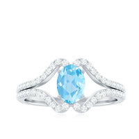 Designer Aquamarine Diamond Oval Engagement Ring with Split Shank