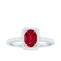 Oval Cut Lab Created Ruby and Diamond Halo Engagement Ring