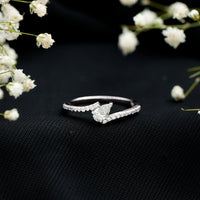 Tilted Pear Shape Simulated Diamond Bypass Promise Ring