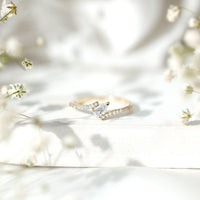 Tilted Pear Shape Simulated Diamond Bypass Promise Ring