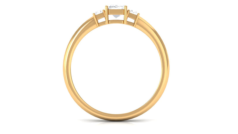 Emerald cut cubic zirconia three-stone engagement ring by Rosec Jewels featuring a sleek silver band and sparkling stones.