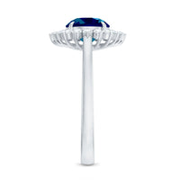 Round London Blue Topaz and Diamond Halo Engagement Ring