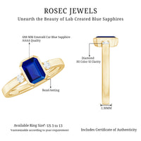 Bezel Set 1.75 Carat Lab Grown Blue Sapphire Emerald Cut Engagement Ring with Diamond