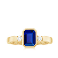 Bezel Set 1.75 Carat Lab Grown Blue Sapphire Emerald Cut Engagement Ring with Diamond