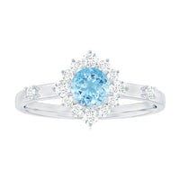 Genuine 0.8 Carat Aquamarine and Diamond Halo Engagement Ring