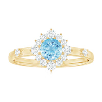 Genuine 0.8 Carat Aquamarine and Diamond Halo Engagement Ring