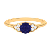 Round 0.9 Carat Blue Sapphire Engagement Ring with Diamond Trio