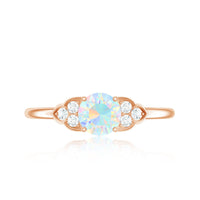 Natural Ethiopian Rainbow Opal Engagement Ring with Diamond Trio