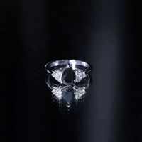 0.85 Carat Pear Shaped Created Black Diamond Solitaire Ring with Diamond