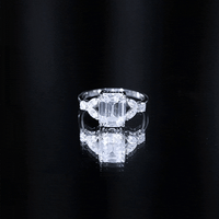 Claw Set Emerald Cut Moissanite Designer Engagement Ring