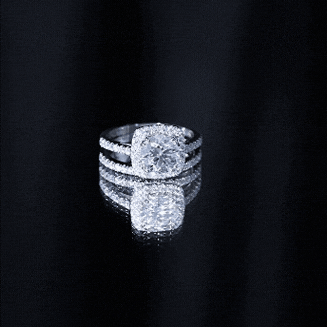 Rosec Jewels 2 Carat cubic zirconia engagement ring with matching wedding band in silver, showcasing sparkling stones and intricate design.