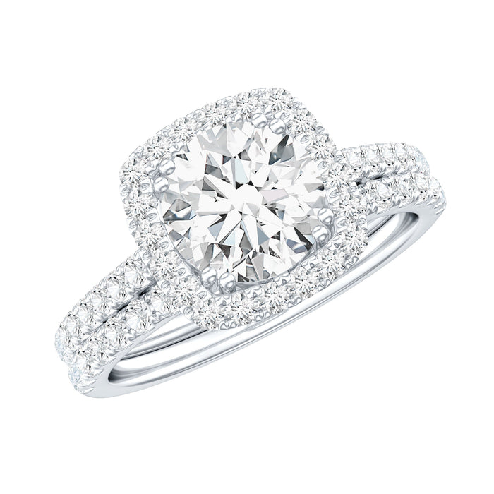 Silver 2 Carat Cubic Zirconia engagement ring with matching wedding band, featuring sparkling stones and intricate detailing.