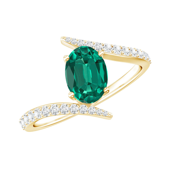 Oval cut lab-grown emerald engagement ring with diamond bypass shank by Rosec Jewels, 0.8 carats, elegant and sparkling design.
