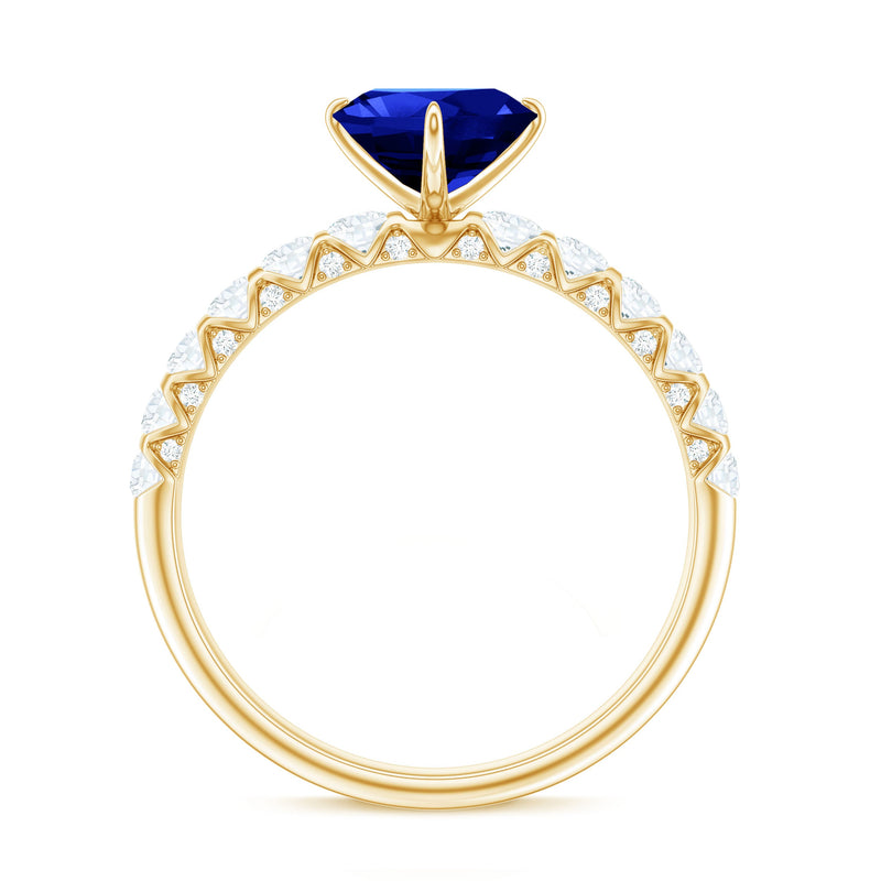 Lab-created 1 carat blue sapphire heart engagement ring with diamonds by Rosec Jewels, showcasing a stunning blue gemstone and sparkling accents.