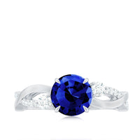 Certified 2.7 Carat Lab Grown Blue Sapphire Engagement Ring with Diamond Crossover Shank