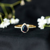 Pear Shape 1 CT Black Opal Engagement Ring with Diamond Halo