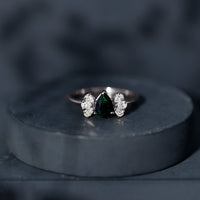 Pear Cut Black Opal Solitaire Engagement Ring with Diamond Trio