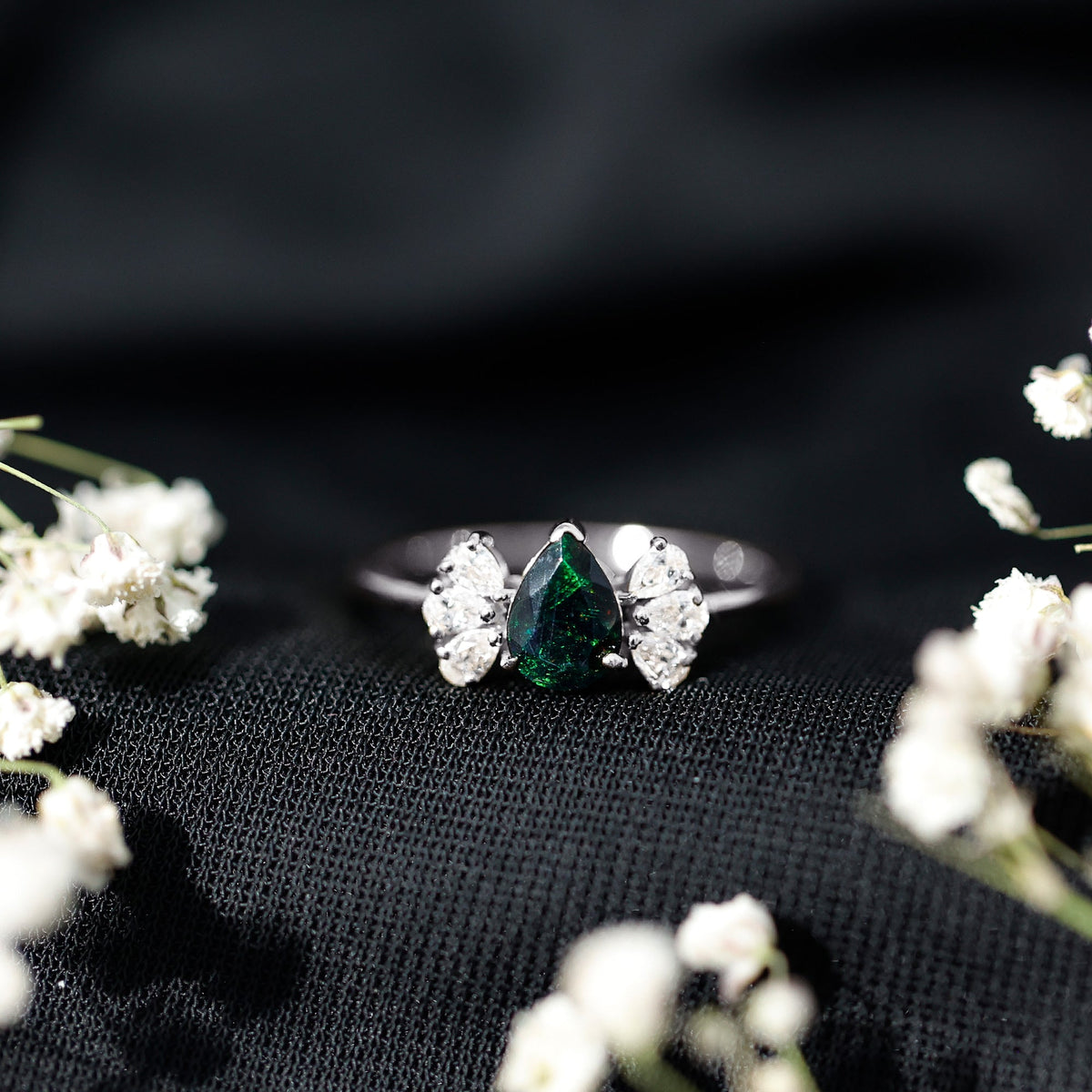 Pear Cut Black Opal Solitaire Engagement Ring with Diamond Trio
