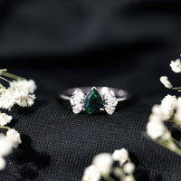 Pear Cut Black Opal Solitaire Engagement Ring with Diamond Trio