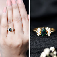 Pear Cut Black Opal Solitaire Engagement Ring with Diamond Trio