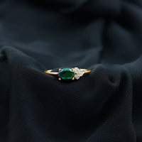 Oval Black Opal East West Ring with Diamond Trio