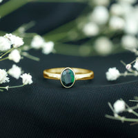 Oval Cut 0.9 Carat Black Opal Bezel Set Engagement Ring
