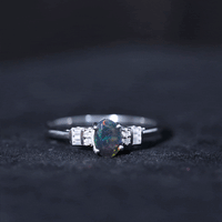 0.9 Carat Oval Cut Black Opal Engagement Ring with Diamond