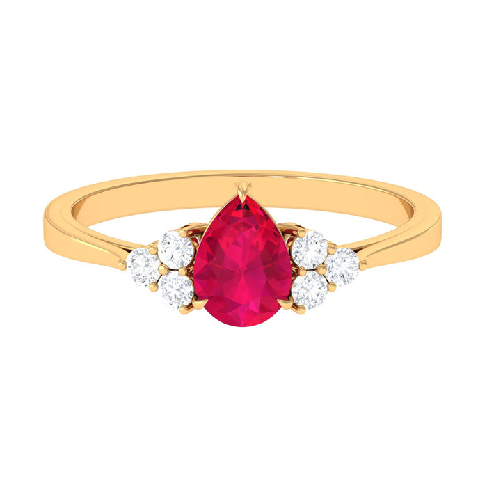 Natural 0.8 carat Ruby teardrop engagement ring with diamond trio accents, crafted by Rosec Jewels, featuring a elegant and vibrant design.
