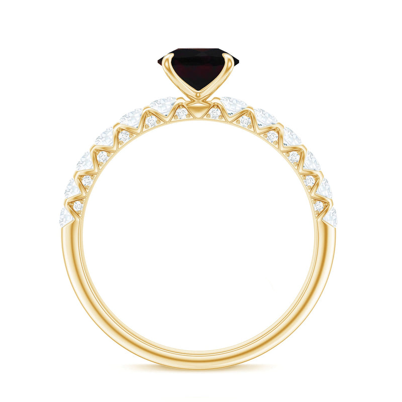 Pear-shaped black opal solitaire engagement ring with diamond accents by Rosec Jewels, showcasing the elegant ring design.