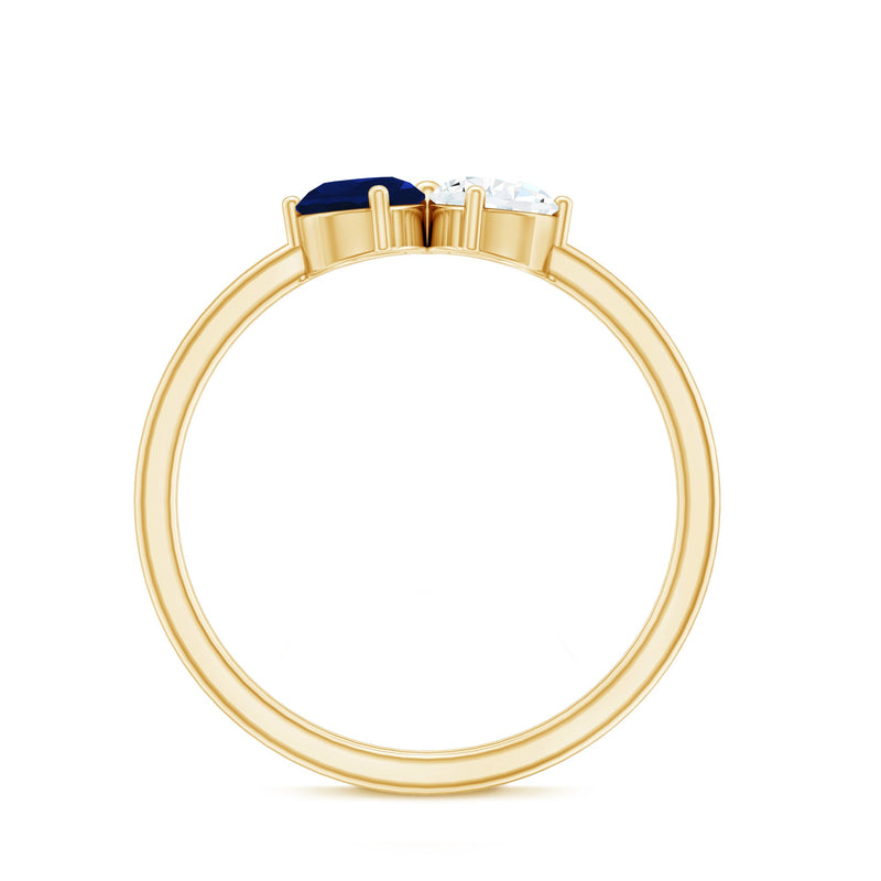 Blue sapphire and diamond Toi Et Moi ring from Rosec Jewels featuring a platinum band and intricate gemstone details.