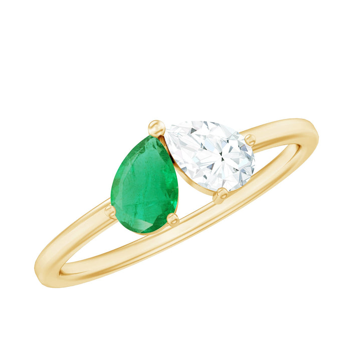 Pear-shaped emerald and diamond promise ring by Rosec Jewels featuring two stones set in a natural design.