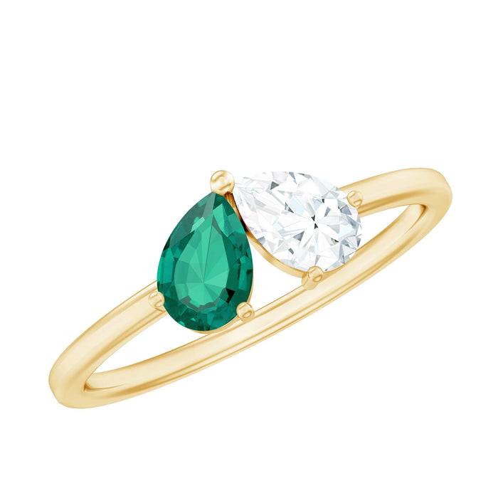 Pear shape lab grown emerald toi et moi ring with diamonds from Rosec Jewels, showcasing the elegant jewelry design.