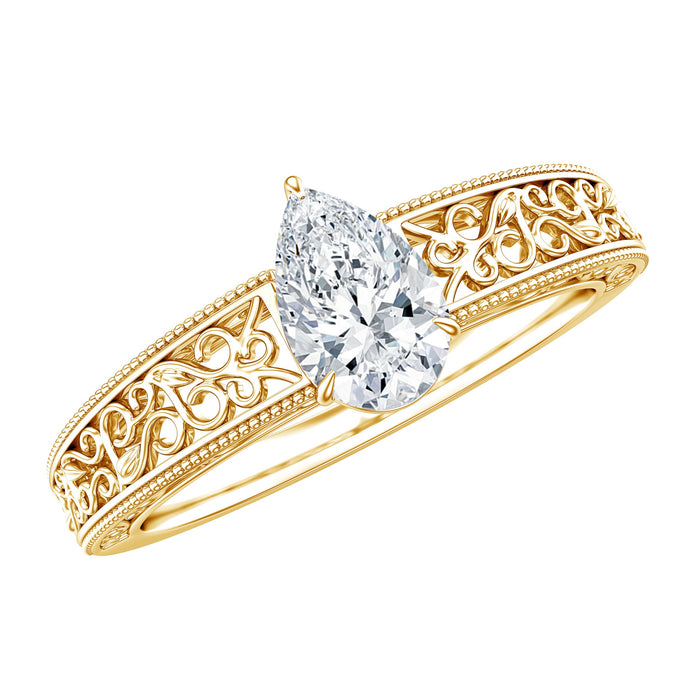 Pear-shaped lab-grown diamond vintage-inspired solitaire ring with intricate metalwork, designed by Rosec Jewels.