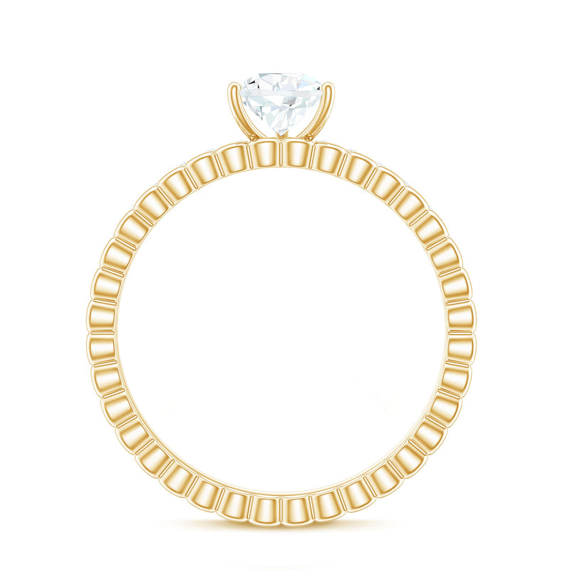Pear shape lab-grown diamond solitaire engagement ring by Rosec Jewels featuring a sleek band and a sparkling pear-cut diamond centerpiece.