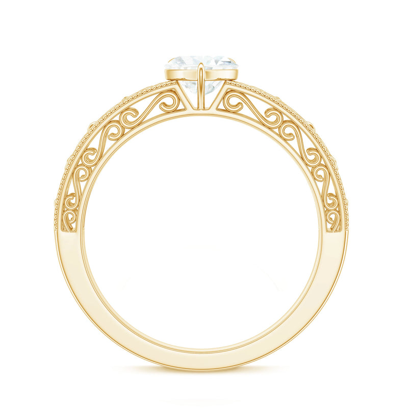 Vintage inspired heart-shaped lab-grown diamond solitaire filigree ring by Rosec Jewels, showcasing intricate metalwork and sparkling center stone.