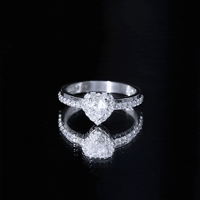 Yellow heart-shaped lab-grown diamond engagement ring with halo setting from Rosec Jewels, showcasing intricate design and sparkling stones.