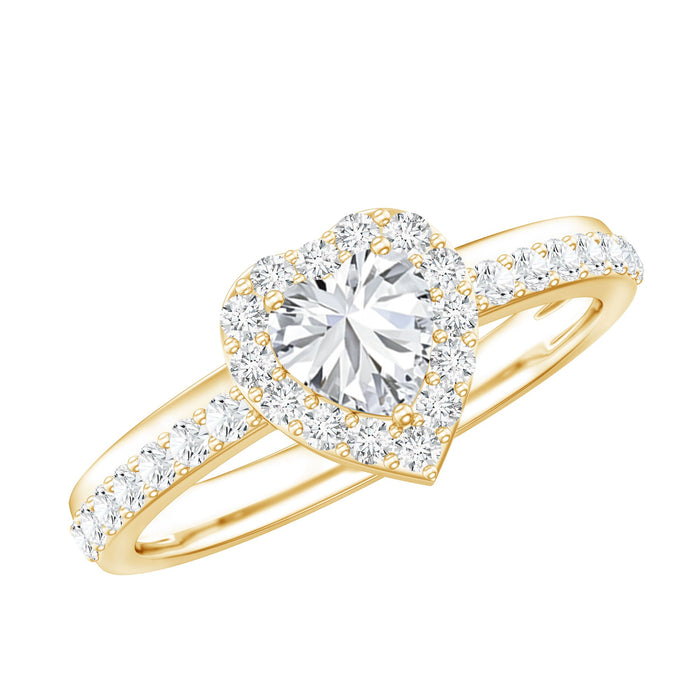Heart-shaped lab-grown diamond engagement ring with halo setting by Rosec Jewels, featuring sparkling center stone and intricate band details.