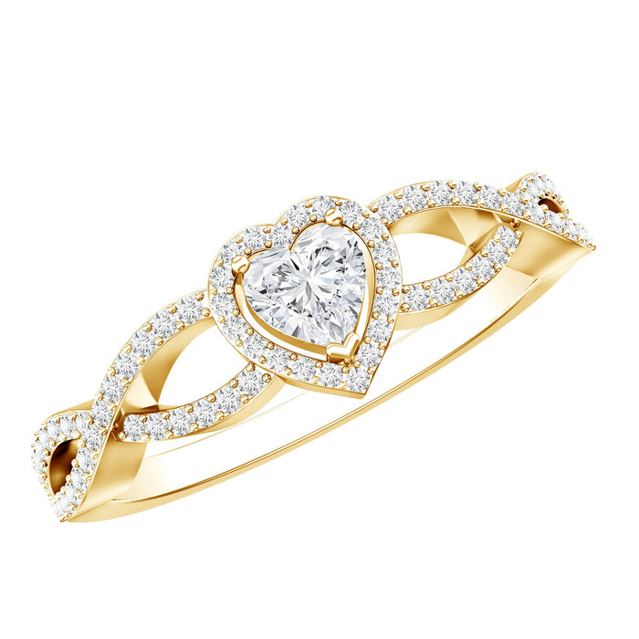 Heart-shaped lab-grown diamond criss-cross engagement ring with rose gold band, featuring sparkling diamonds from Rosec Jewels.