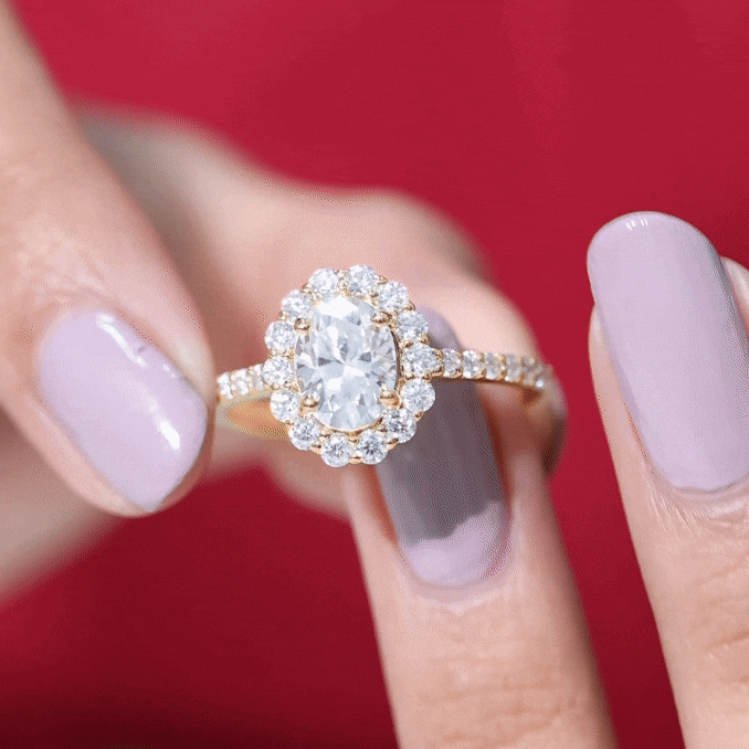 Oval shape lab-grown diamond halo engagement ring by Rosec Jewels featuring a yellow band and intricate halo setting.