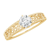Vintage-inspired solitaire lab-grown diamond filigree ring by Rosec Jewels, featuring intricate metalwork and a central sparkling diamond.