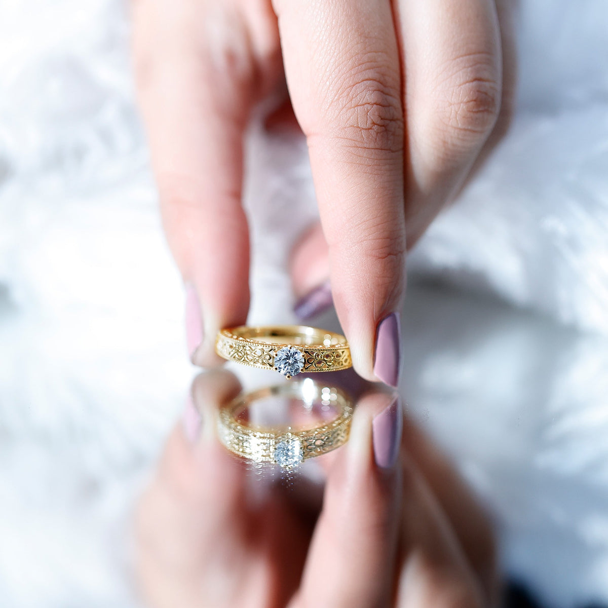 Vintage-inspired solitaire lab-grown diamond filigree ring by Rosec Jewels, featuring intricate metalwork and a sparkling central diamond.