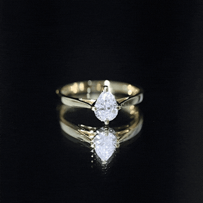 Yellow gold solitaire lab-grown diamond teardrop engagement ring from Rosec Jewels, featuring a sparkling teardrop-shaped center stone.