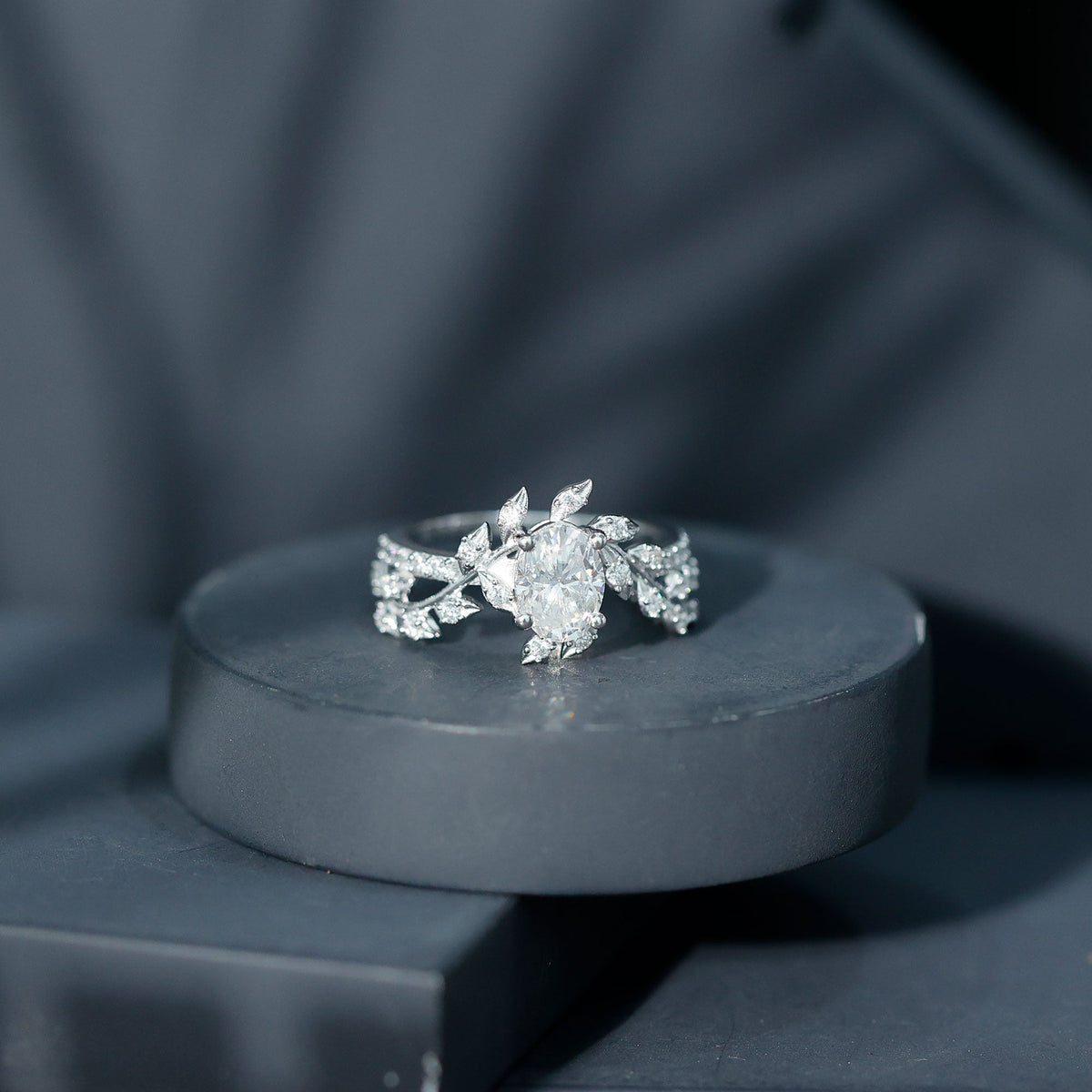 Certified 1.2 carat Moissanite vine engagement ring in silver with intricate design, from Rosec Jewels.