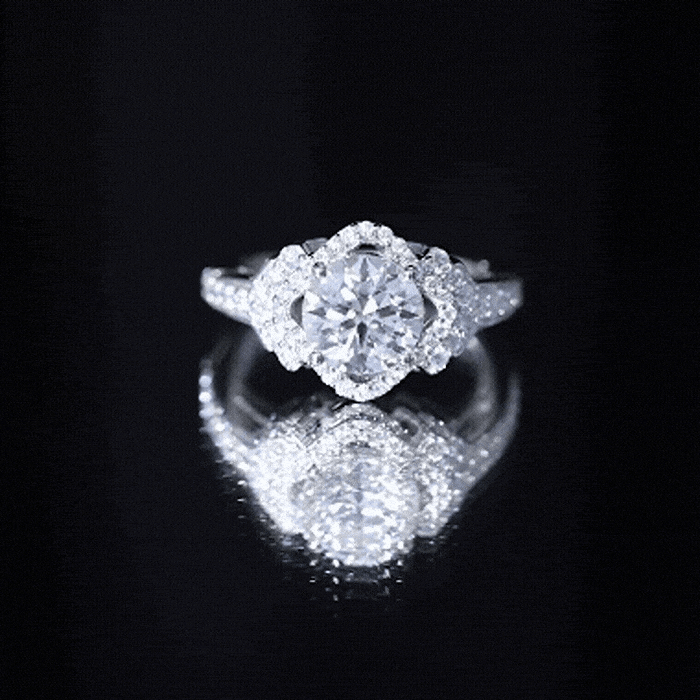 Certified 2 Carat round cut moissanite antique engagement ring by Rosec Jewels, showcasing intricate vintage design and sparkling center stone.
