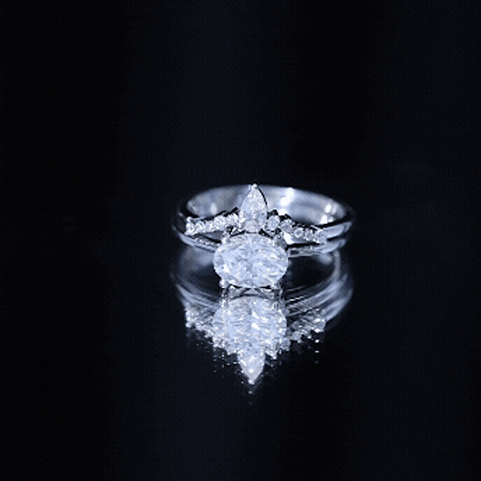 Oval-shaped 1.2 carat moissanite engagement ring with east-west setting and band by Rosec Jewels.