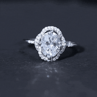 Vintage-inspired 2 carat moissanite engagement ring in silver with intricate detailing, designed by Rosec Jewels.