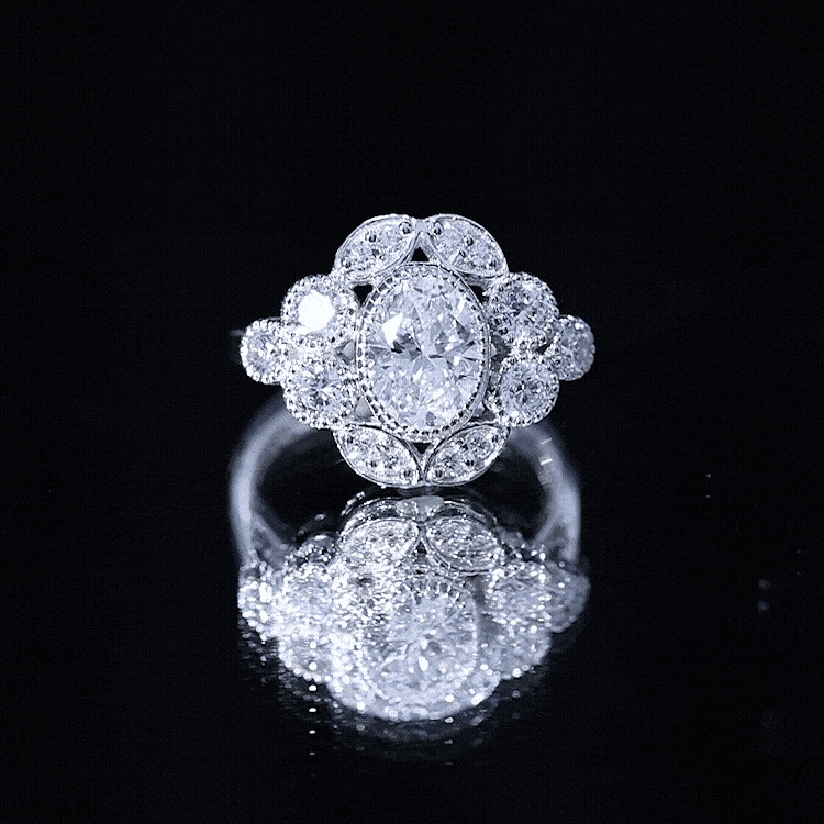 Oval moissanite engagement ring in white gold with a 1.2 carat center stone from Rosec Jewels, showcasing a sparkling, elegant design.